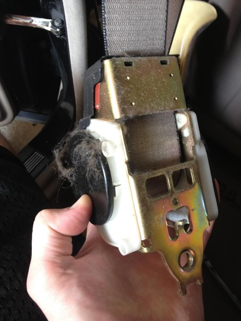 Seat belt is retractor is slow and weak.